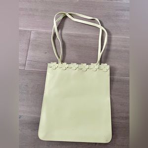 FURLA PURSE  pastel grn leather floral edge w snap closure & inside zip pocket.